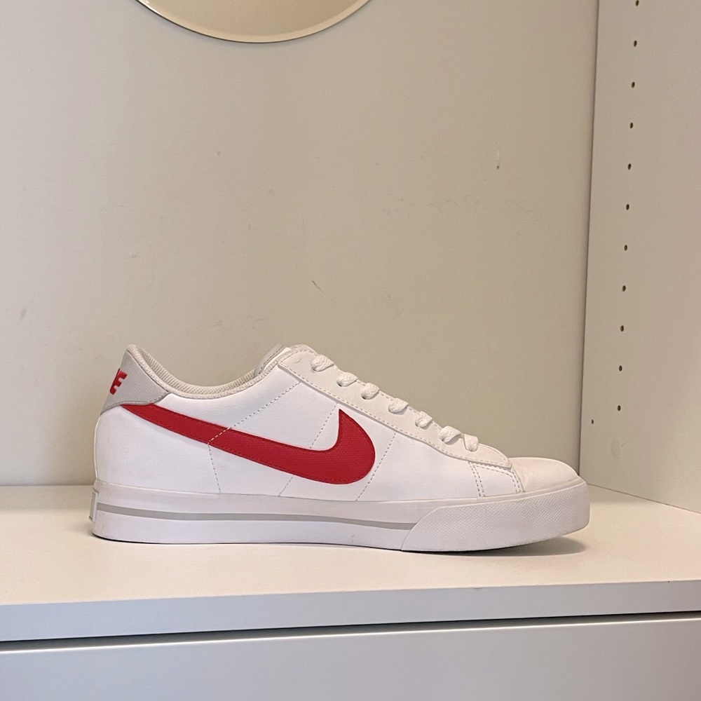 Nike White Low-Top Sneakers with Red Swoosh